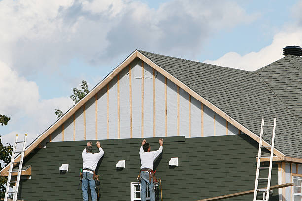 Professional Siding Replacement technician working in Brownsville, TX